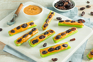 Celery Sticks with Sunbutter and Raisins on Top