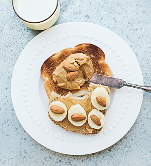 Banana and Almond Butter Toast Sprinkled with Cinnamon